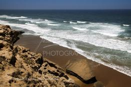 Image du Maroc Professionnelle de  Plage sauvage près du village Tamri sur la route Nationale  N1 (Essaouira - Agadir), le 14 Juillet 2003. (Photo / Abdeljalil Bounhar)

 